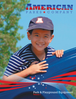 Boy wearing a hat on a playground with the American Parks Company logo