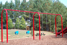 children climbing on a climber